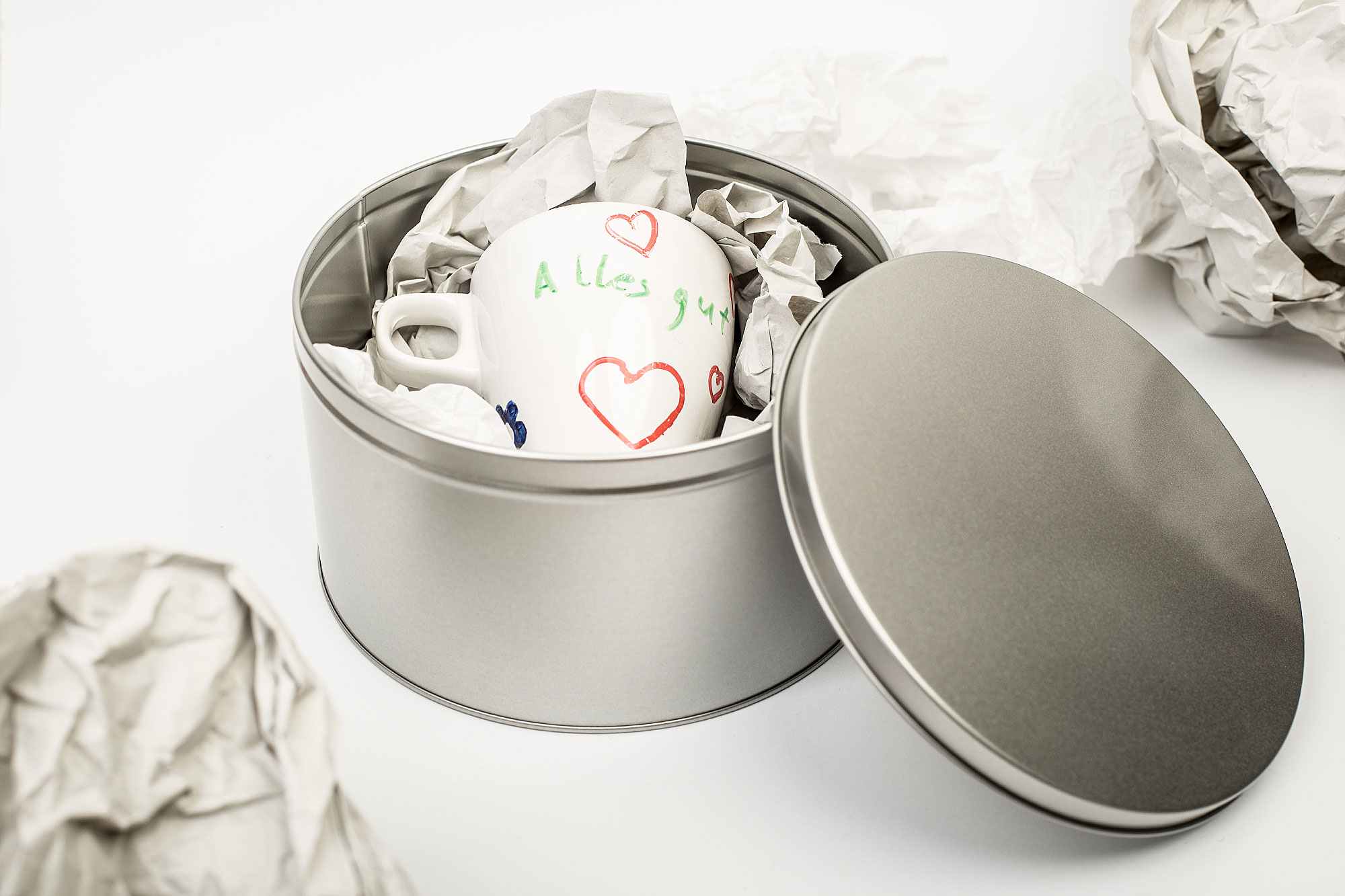 Boîte métallique ronde dorée pour cadeaux et emballages premium